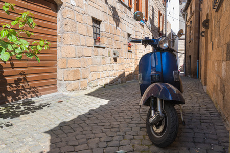 Classic Italian mode of transport through the narrow winding streetsの写真素材