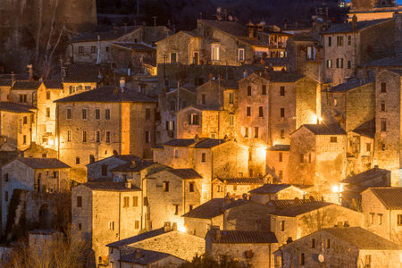 Night panorama of the Etruscan medieval town in Tuscany, Sorano.の写真素材