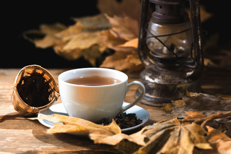 Cup of green tea on a black backgroundの写真素材