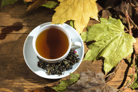 Cup of green tea on a black backgroundの写真素材