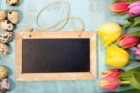 Easter and spring background with tulips and eggs.の写真素材