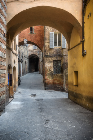 Alleys on a rainy spring day in a small magical village Siena, Tuscany.の写真素材