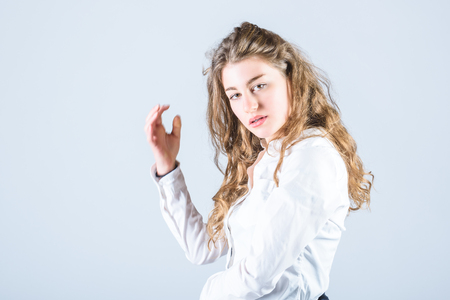 Lovely Anna student beautifully posing on a white background.の写真素材