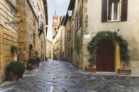 Walk on a rainy day through the streets of the beautiful town, Pienza, Tuscanyの写真素材