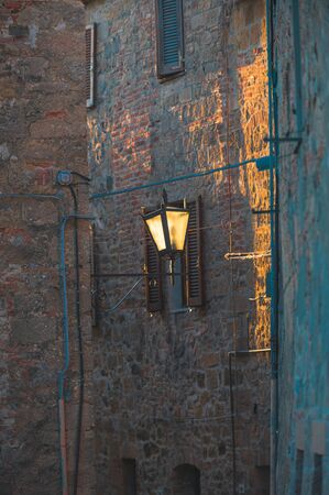 Spring streets and alleys in the Italian town of Monticchielloの写真素材