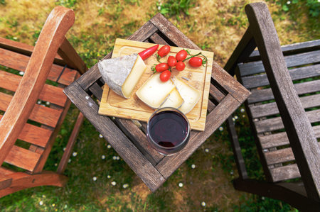 Sunny aperitivo with sheep's cheese and nature