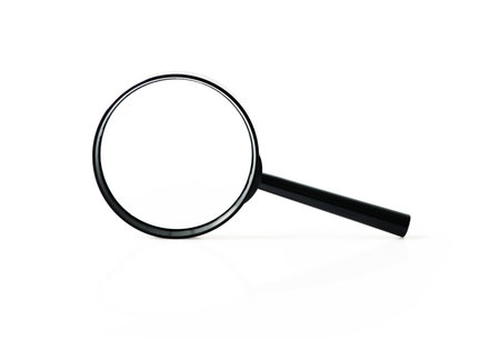 Big black metal loupe stands on white surface, front viewの写真素材