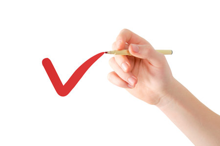 Right hand writing red mark in air, reverse view, isolated on white