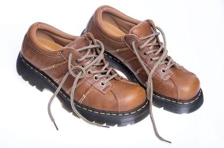 Brown leather boot over white background
の写真素材