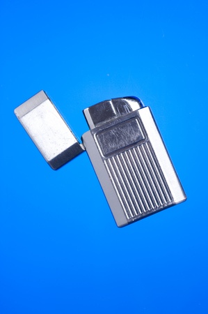 Lighter on a blue background
の写真素材
