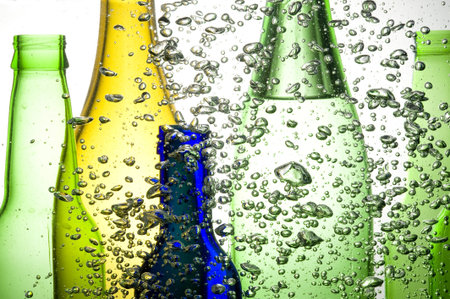 Background with colour bottle and bubbles waterの写真素材