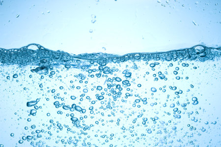 Background with blue water. Creative splashing