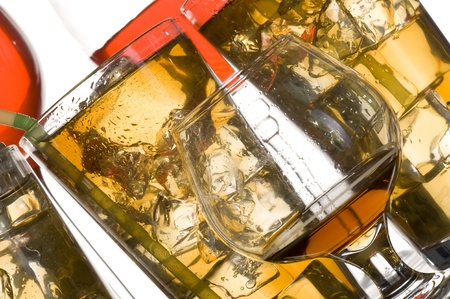 Glass with alcohol and ice on white background
の写真素材