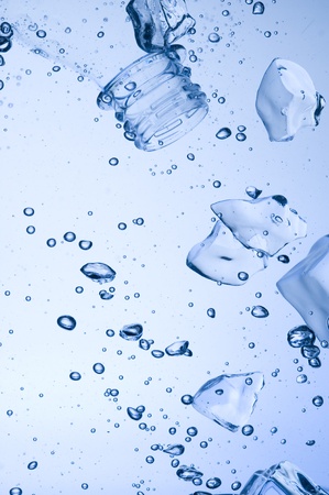 Mineral water with ice. Creative splashing blue water
の写真素材