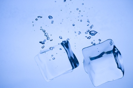 Abstract with blue ice. Creative splashing water and iceの写真素材