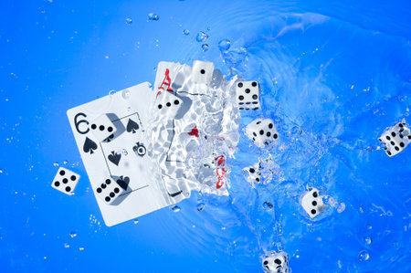 Several dice combination and playing cards on water