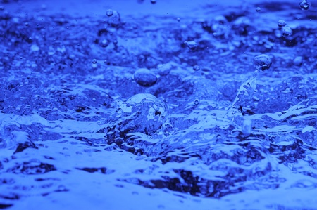 Background with blue water. Creative splashingの写真素材