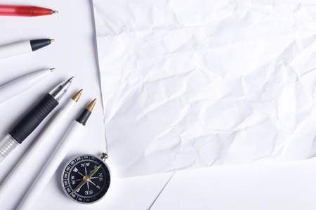 Business background with pen and compassの写真素材