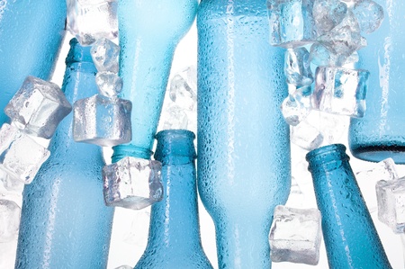 Blue creative bottles and clear ice .Cocktail with ice
の写真素材