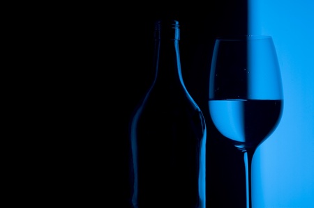 Glass on creative blue backgroundの写真素材