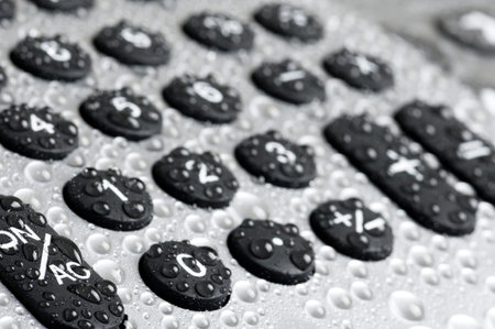 Detail of a calculator. Technology background