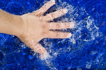 Blue Background with  water splashing
の写真素材