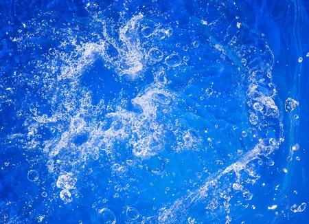 Blue Background with  water splashing
の写真素材