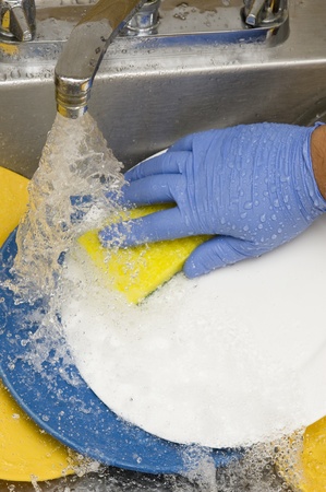 Washing kitchen ware on the silk
の写真素材