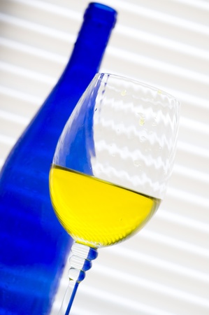 
Wine on the  white jalousie
の写真素材