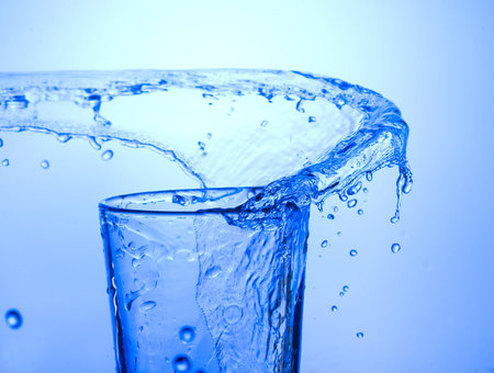 Fresh  spray water on blue background