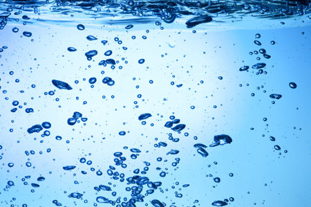 Splashing blue water. Bubble water