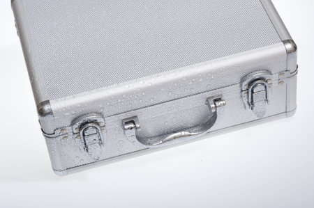 Metal suitcase isolated on the white background