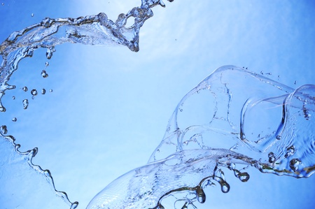 Splashing fresh blue water. Background aqua drop.の写真素材