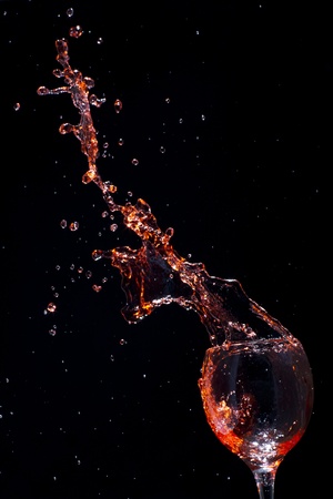 Splashing red wineの写真素材