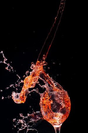 Splashing red wineの写真素材