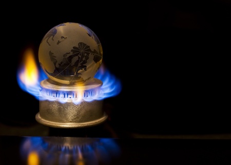 Gas flame with earthの写真素材