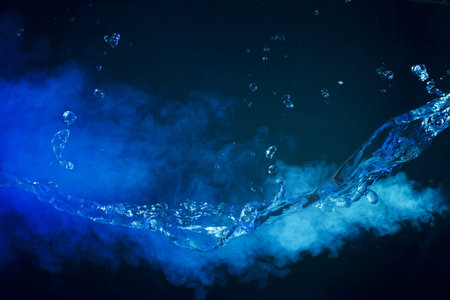 Splashing water on black backgroundの写真素材