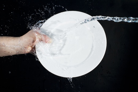 Splash water on a plateの写真素材