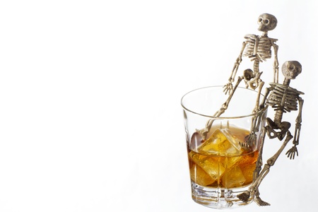 Skeleton with a Whisky. Alcoholism problemの写真素材