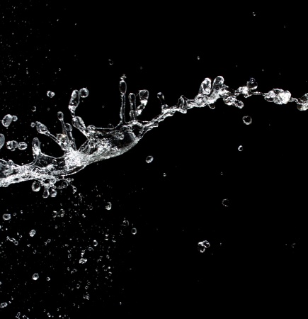 Water splash. Isolated on black backgroundの写真素材