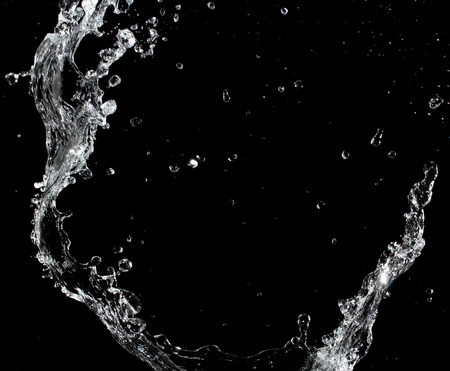 Water splash. Isolated on black backgroundの写真素材