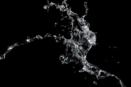 Water splash. Isolated on black backgroundの写真素材