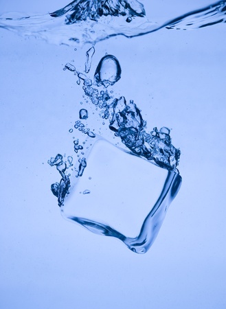 Abstract with blue ice. Creative splashing water and iceの写真素材