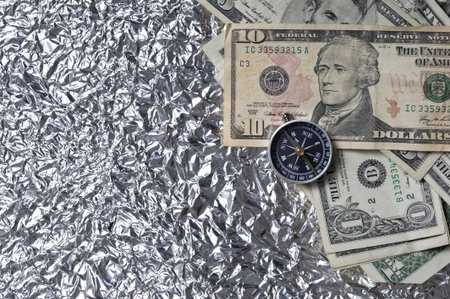Aluminum Foil Background.Creative metallic texture and dollar