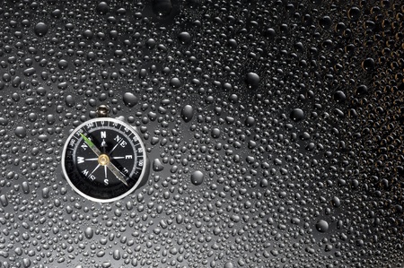 Texture metallic with drops water and compass 
の写真素材