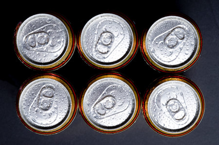 Shiny soda/beer cans viewed from above