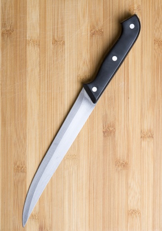 Well used chopping board and knifeの写真素材