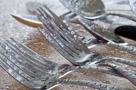 A group of dinner forks. Backgrounr with kitchen utensil
の写真素材