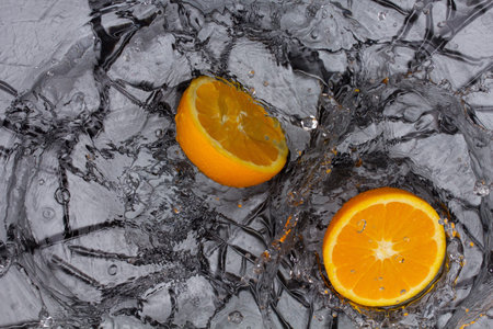 Orange and splashing water