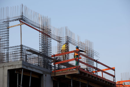 Workers prepearing concrete reinforcemente